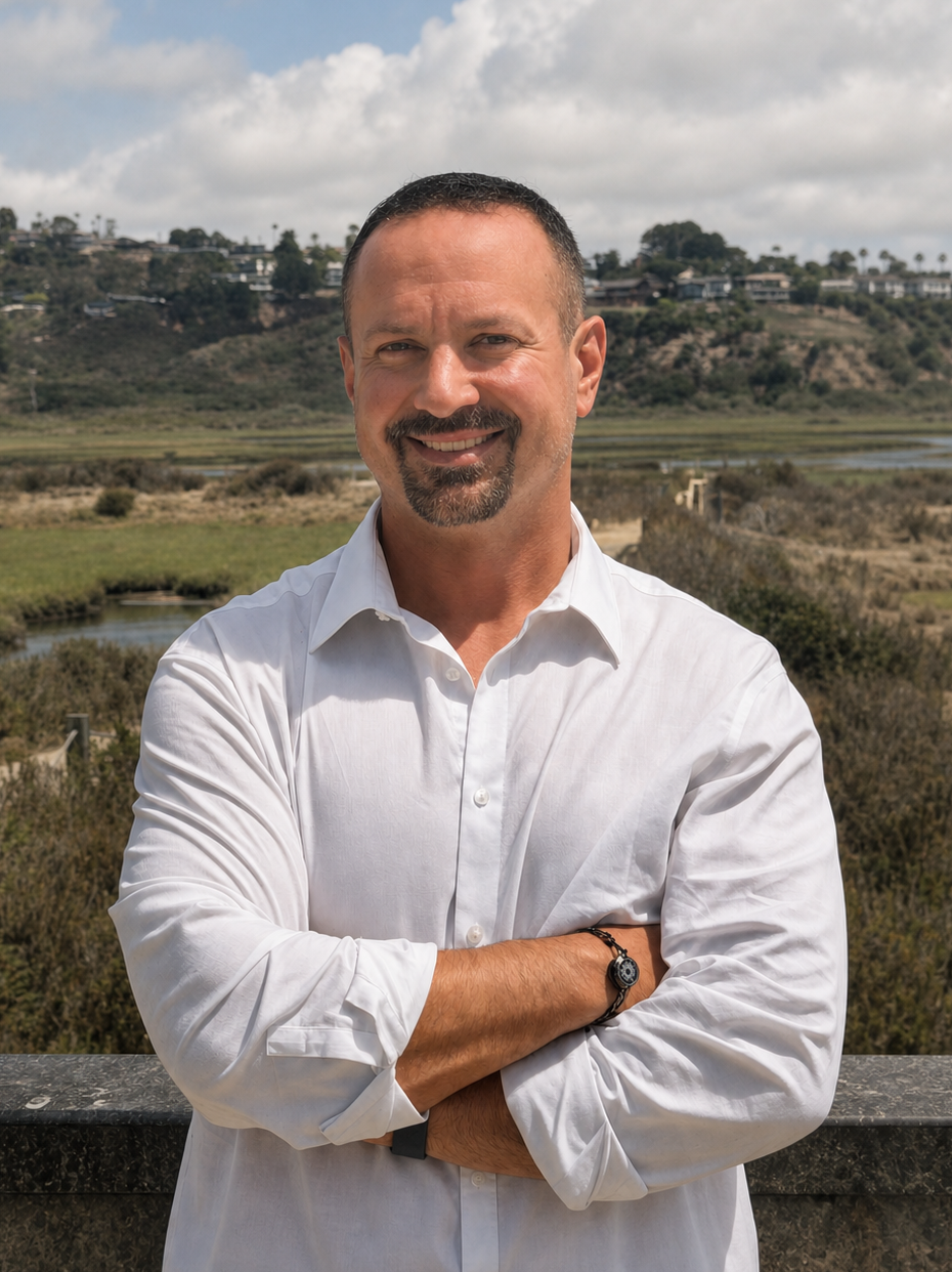 Dr. Justin Butler, D.C. standing outdoors near the North County San Diego coast.